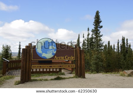 Signpost In Arctic Circle Near Dalton Highway, Alaska Stock Photo