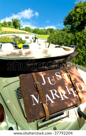 stock photo A retro wedding car with luggage marked 39just married 39