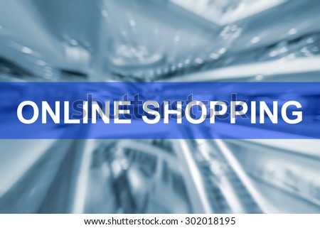 Online shoping word blue tone blurred interior of shopping mall for banner business background