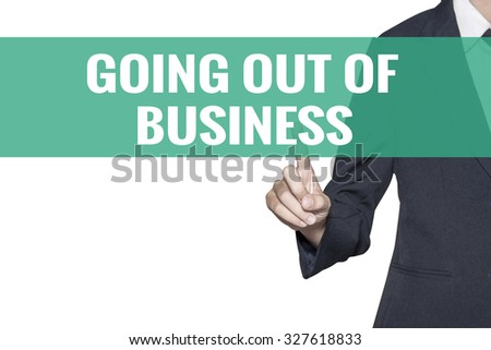 Going Out Of Business word on virtual screen touch by business woman on white background