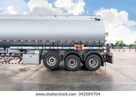 Truck with fuel tank in gas station