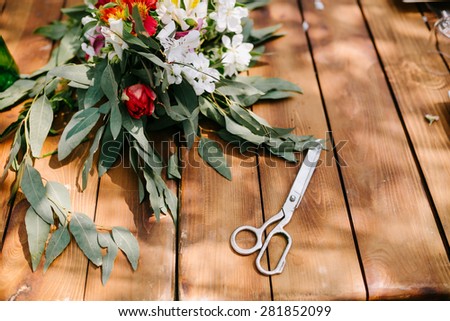 scissors on the wood table