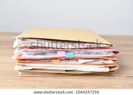 File Stack top view, file folder pace on wood desk background