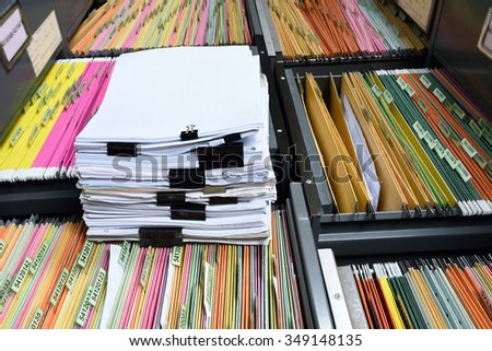 a file folder with documents and important documents