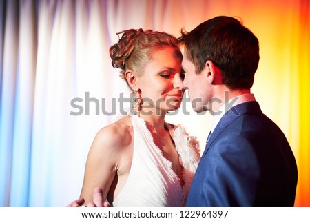 Wedding dance bride and groom in red light