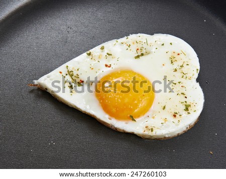 Fried eggs in heart form for breakfast