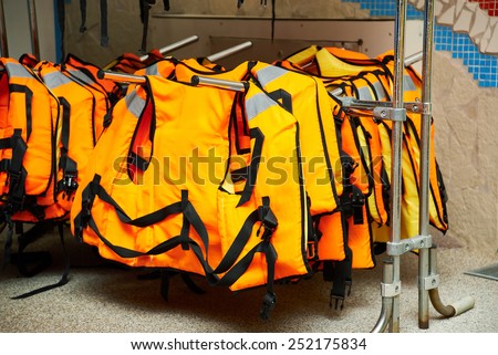Life jacket hanging on a hanger in the store
