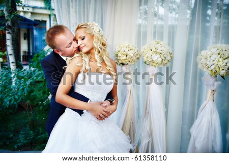 stock photo Happy bride and groom in wedding gazebo