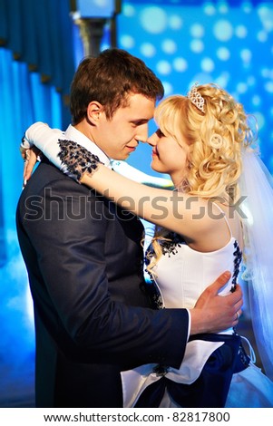 stock photo Wedding dance the bride and groom on a blue background