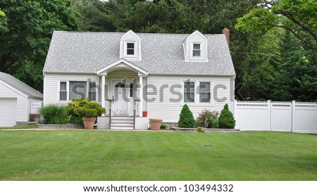Suburban Middle Class Cottage Style Bungalow Home in Residential Neighborhood