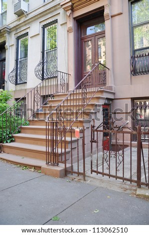 Brownstone Home Garden Apartment Gate and Steps leading to entrance way