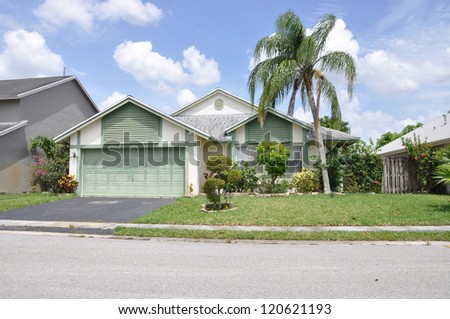 Suburban Home Snout Back Split Architecture Residential Neighborhood Blue Sky Clouds