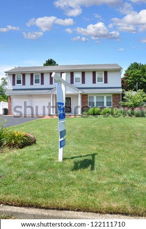 Real Estate For Sign Front Yard Lawn Suburban High Ranch Home Sunny Blue Sky Day