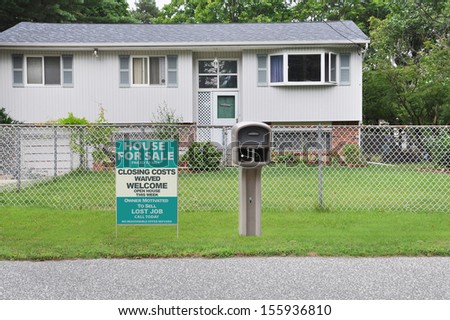 Real Estate Home for Sale Sign Lost Job No Closing Costs front yard lawn of High Ranch style home curbside Mailbox USA