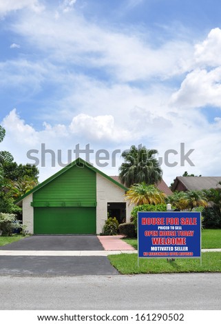 Real Estate Welcome Open House For Sale Sign front Yard lawn suburban back split style home with snout garage blacktop driveway sunny blue sky clouds residential neighborhood USA