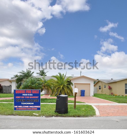 For Sale Open House Tomorrow Real Estate Sign Ranch Style Suburban Home in Residential Neighborhood Blue Sky Clouds USA