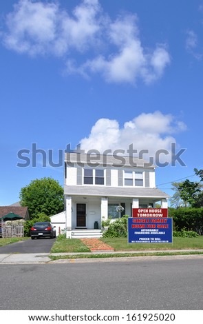 Real Estate Open House Tomorrow For Sale Sign Front Yard Suburban Home Blue Sky Clouds Sunny Daytime USA Residential Neighborhood