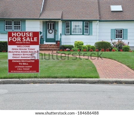 Real Estate House for Sale sign Close Up of Suburban Home House Front Landscaped Brick Walkway Curb Residential neighborhood USA