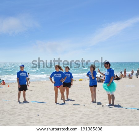 ALICANTE, SPAIN - APR 27: Barbaras frisbee team from Alicante are standing in end zone preparing to start to play in the Ultimate Frisbee tournament hosted on San Juan beach in Alicante Apr 27, 2014.