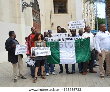 ALICANTE, SPAIN - May 14: Assn of Nigerians in front of the Plaza de Toros began protest for help with kidnapped girls from Chibok, Nigerian government school abducted in April. Alicante May 14, 2014.