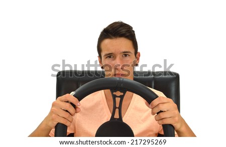 Teenager Driving Steering Wheel looking at camera with sad serious face isolated on white background