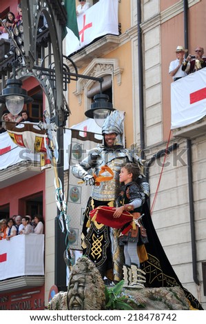 ALCOY, SPAIN - MAY 14: Man dressed in Armor in the largest annual Moors and Christians parade commerating battles during the 8-15th century between Muslims and Christians. Alcoy May 14, 2011