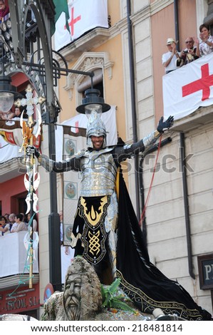 ALCOY, SPAIN - MAY 14:Man dressed in Christian legion armor in largest annual parade commemorating battles during the 8-15th century between Muslims and Christians. Alcoy May 14, 2011