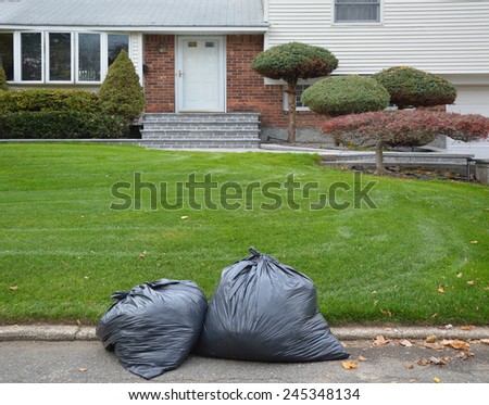 Black Plastic Trash Bags suburban home residential neighborhood USA