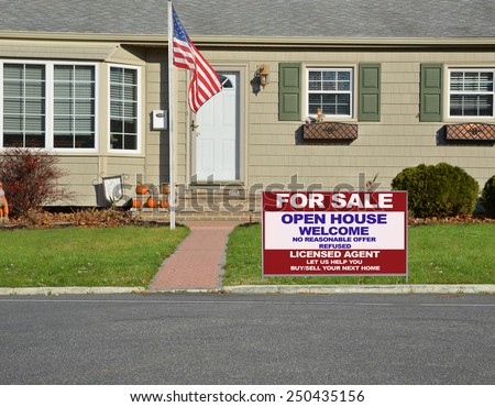 American flag pole Real estate for sale open house welcome sign closeup view Suburban home landscaped lawn sunny residential neighborhood autumn day USA