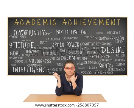 Teacher  at desk in front of Academic Achievement Blackboard: Intelligence, Readiness, Attitude, Opportunity, Preparedness, Resources, Goal, Access, Participation, Listen, Technology, Persistence