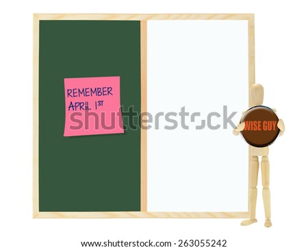 Remember April 1st Post it note Mannequin with Wise Guy button chalkboard white board isolated on white background