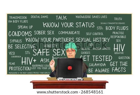 Teacher with Get Tested button on computer pointing to Safe Sex Chalkboard: Get Tested, Know Your Status, Get Facts, Protection, Question, Responsible Sex, Truth, Be Aware, Unsure Say No, Sober Sex