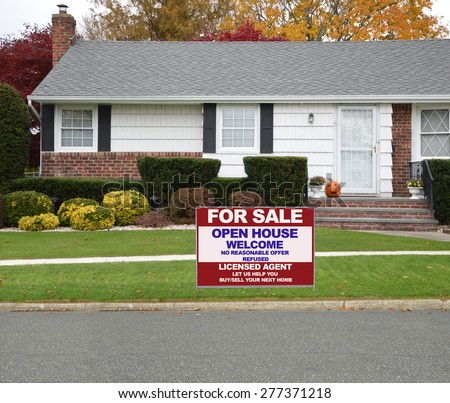 Real estate for sale open house welcome sign Close up of Ranch style Home Autumn Day Residential Neighborhood USA