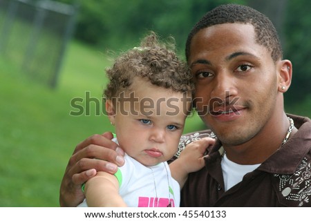 Two Generation Family African American Man with toddler Hot Summer Day
