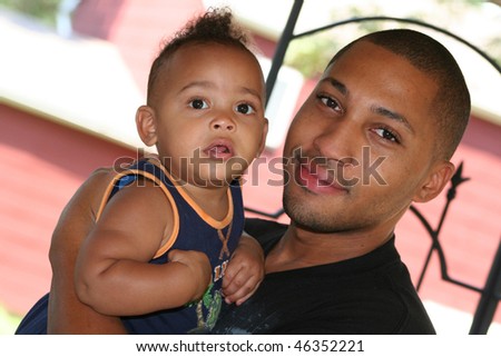 African American Latin Family man with child