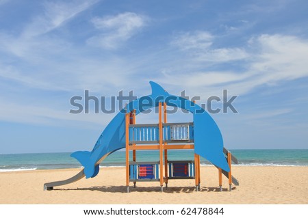 Empty Beach Child Playground Jungle Gym Equipment Beautiful Blue Sky with Clouds