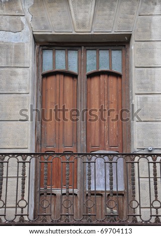Old Run Down Mediterranean Wood Door and Cast Iron Balcony in Orihuela Costa Blanca Alicante Spain Europe