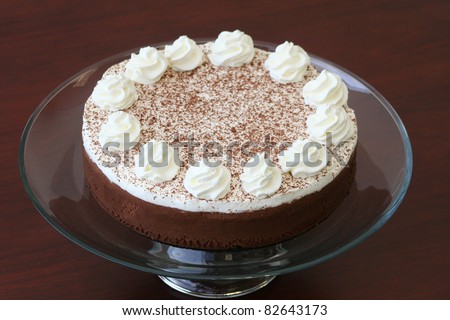 Dessert Chocolate Mousse with Whipped Cream on Clear Glass Cake Platter