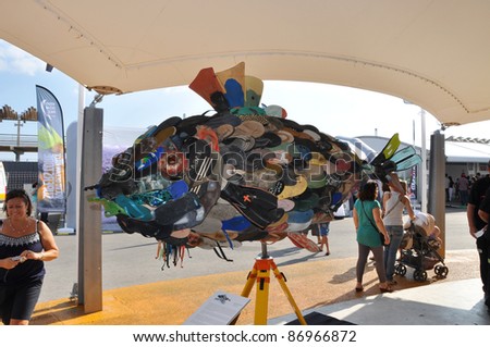 ALICANTE, SPAIN - OCT 16: Flip Flop fish is one of six Skeleton Sea sculptures made of beach trash on exhibit in the 2011-2012 Volvo Ocean Race village on the harbor of Alicante, Oct 16, 2011.