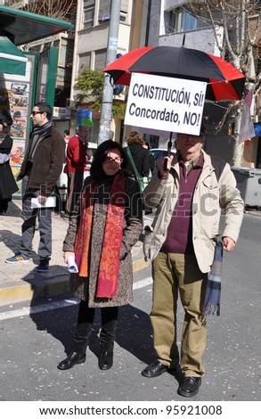 ALICANTE, SPAIN - FEB 19: Syndicatos organized a demonstration protesting job losses and financial cuts by Political Party politicians. Some people marched with signs in protest Alicante Feb 19, 2012.