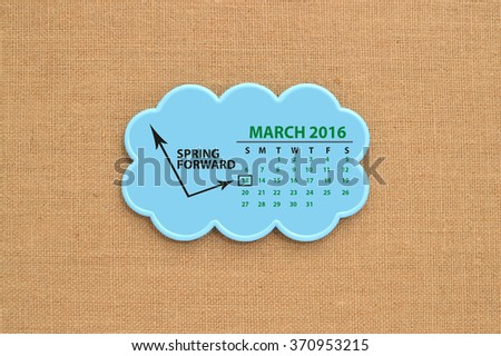 Spring Forward (Daylight Savings Time Begins) March 13, 2016 Calendar Cloud hanging on Canvas Board Background