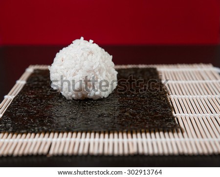 rice ball for sushi on the mat.