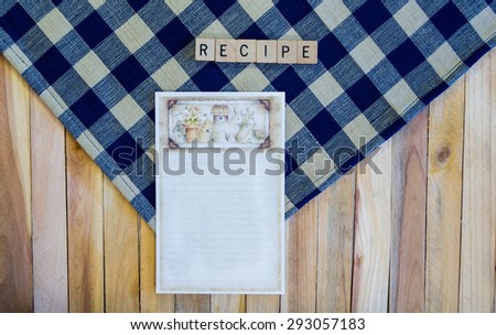 Recipe Card on Navy Check Napkin and Wood Planks