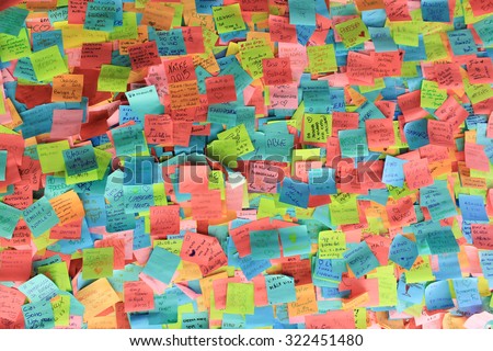 MILAN, ITALY-SEPTEMBER 18, 2015: photo of multicolored filled paper stickers on the wall front view at EXPO 2015, Milan