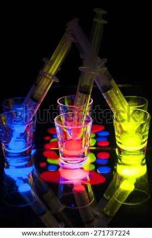 Glow Stick Juice in Shot Glasses with Syringes