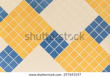 pattern of small square tiles that form a pattern for background