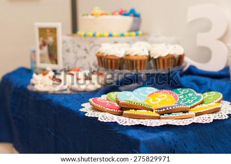 cakes and cupcakes on the table on birthday