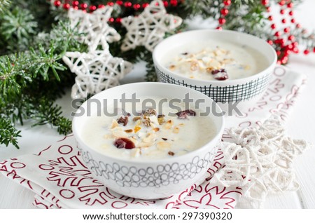 Sweet almond milky soup with rice, raisins and cranberries (polish christmas eve food)
