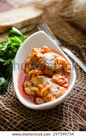 Herring with tomato and onion marinade (polish food)