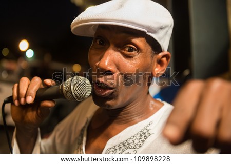 MIAMI, FL - CIRCA JULY 2012: Street performer singing  in Little Havana circa July 2012 in Miami,  during \